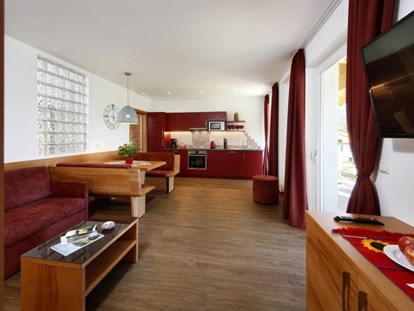 Pensionen - Oberbozen - Unsere rote Ferienwohnung ist groß und luftig, hell und modern, genau richtig um neue Energie zu tanken. - Residence Sonnengarten**