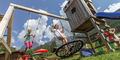 Pensionen - Langlaufloipe - Pinzgau - Schaukeln und Rutschen - Urlaubsparadies Liebmannhof