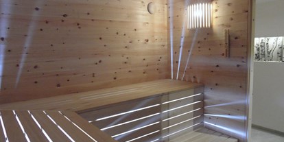 Pensionen - Kühlschrank - Vorarlberg - "Almrausch" verfügt über eine eigene private Sauna in der Wohnung - Schwarzmann's Ferienwohnungen