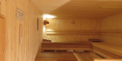 Pensionen - Umgebungsschwerpunkt: Meer - Holtgast - Neue Gartensauna mit Münzbetrieb - Ferienwohnung Kutscherhuus mit Sauna in Ostfriesland