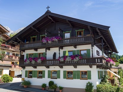 Pensionen - Restaurant - Tirol - Hausansicht - Zimmer & Appartements Pension Hinterholzer