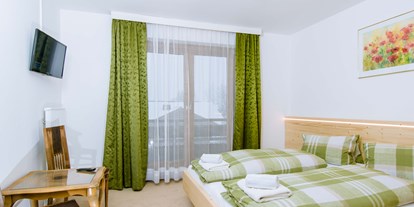Pensionen - Umgebungsschwerpunkt: am Land - Hüttschlag - Schlafzimmer im Ferienhaus - Ferienhaus Kuchelberg