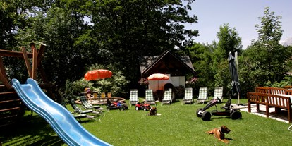 Pensionen - Skilift - Bad Gastein - Gemütliche Stunden in unserem gepflegten Garten - Pension-Appartements Ötzmooshof ***
