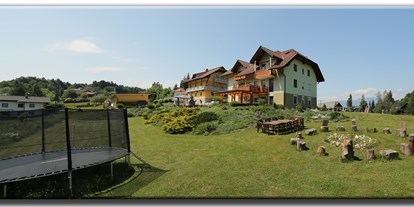 Pensionen - Garten - Latschach (Velden am Wörther See, Finkenstein am Faaker See) - Trampolin und Lagerfeuerstelle - Gästehaus Karoline