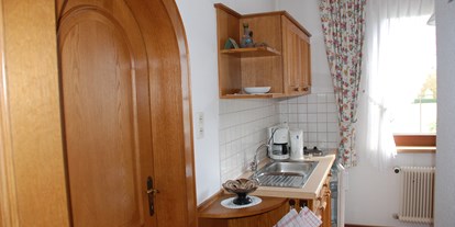 Pensionen - Oberlienz - Kleine Küche im eigenen Raum in der FV 50 m² - Pension Leyrer