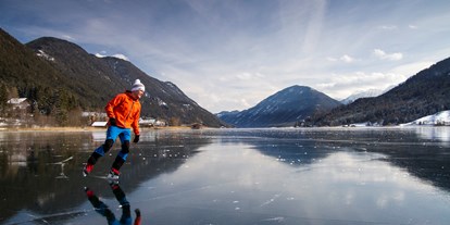 Pensionen - Fahrradverleih - Oberdrautal - Eislaufen im Winter...  - Pension Bergblick am Weissensee