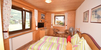 Pensionen - Garten - St. Johann in Tirol - Familien Appartament mit zwei getrente Schlafzimmern für 4 Personen - 1. Schlafzimmer - Golf & Ski Chalet****