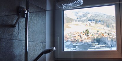 Pensionen - Skilift - Kaprun - Dusche mit Aussicht - Frühstückspension und Appartements Norika