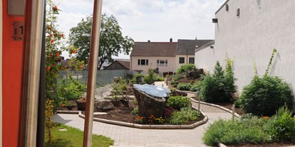 Pensionen - Enzersfeld im Weinviertel - Schau- und Erlebnisgarten - Ökologisches Gästehaus Luger