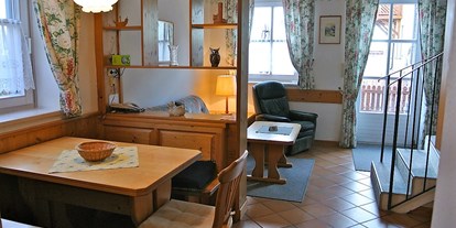 Pensionen - weitere Verpflegungsmöglichkeiten: Abendessen - Rauchwart - Wohnzimmer mit Ausgang zur Terrasse - Ferienapartment  im Biodorf Bad Waltersdorf