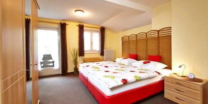 Pensionen - Radweg - Ehrwald - Junior-Suite Zugspitze - Schlafzimmer - Gästehaus im Winkel