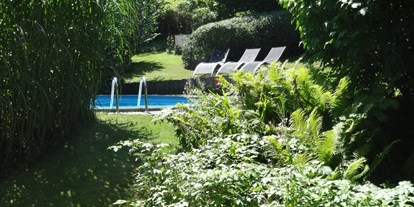 Pensionen - Umgebungsschwerpunkt: Fluss - Ruhpolding - Garten mit Pool - Gästehaus Ehrlich